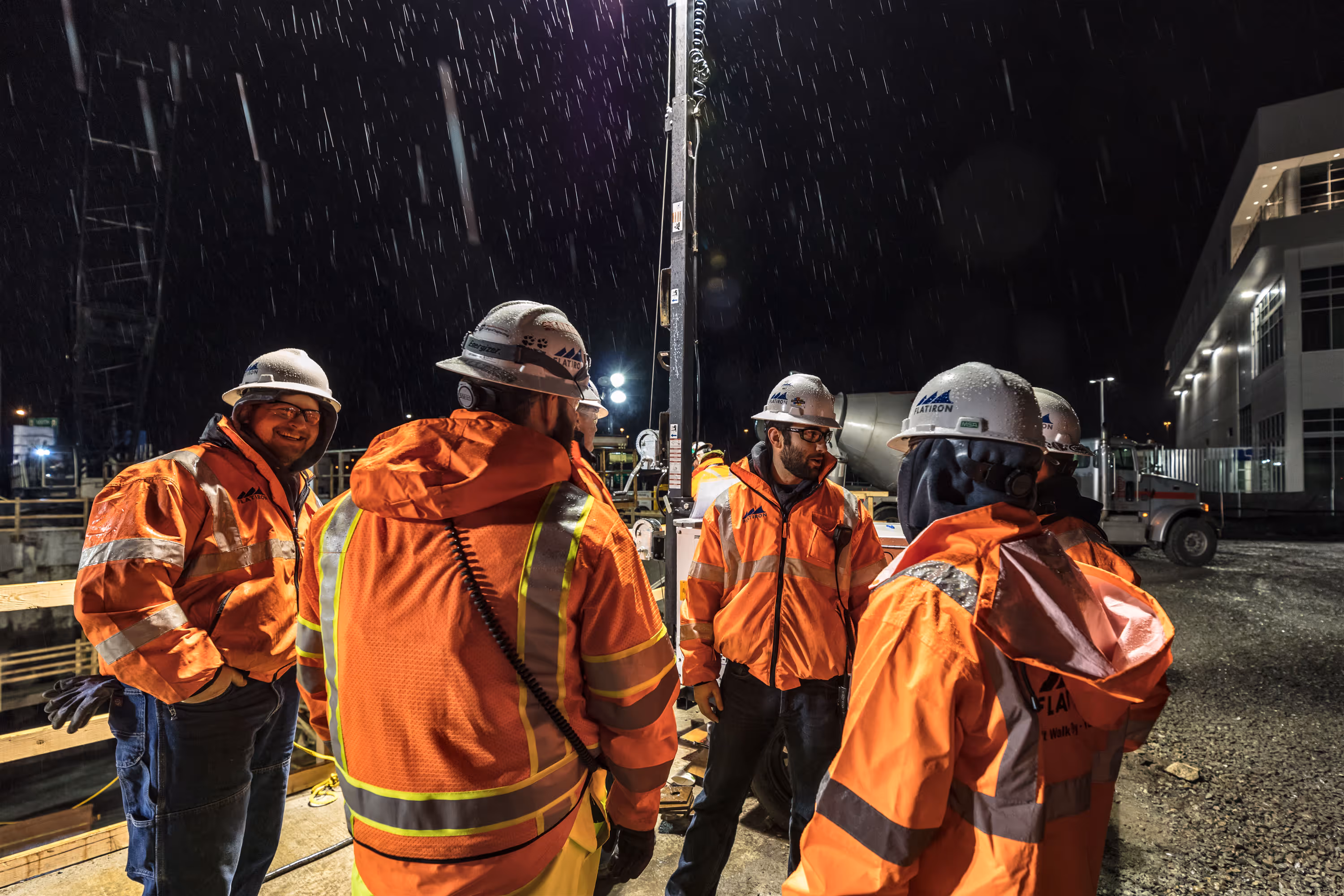 Nightime concrete pour, stormwater treatment facility, rainstorm, Seattle, Washington