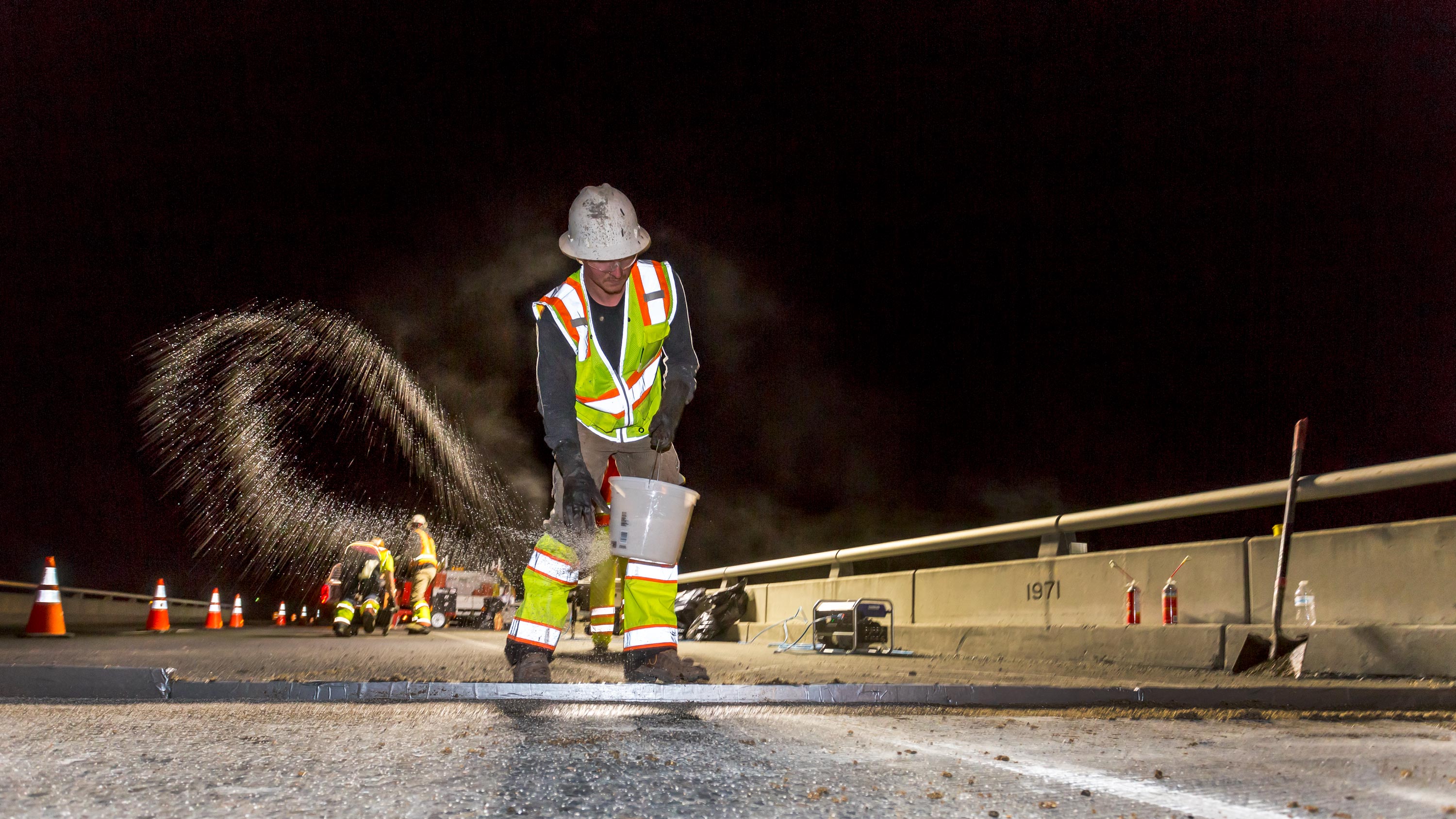 George Washington Bridge aka Aurora Bridge construction worker at night, Seattle, Washington