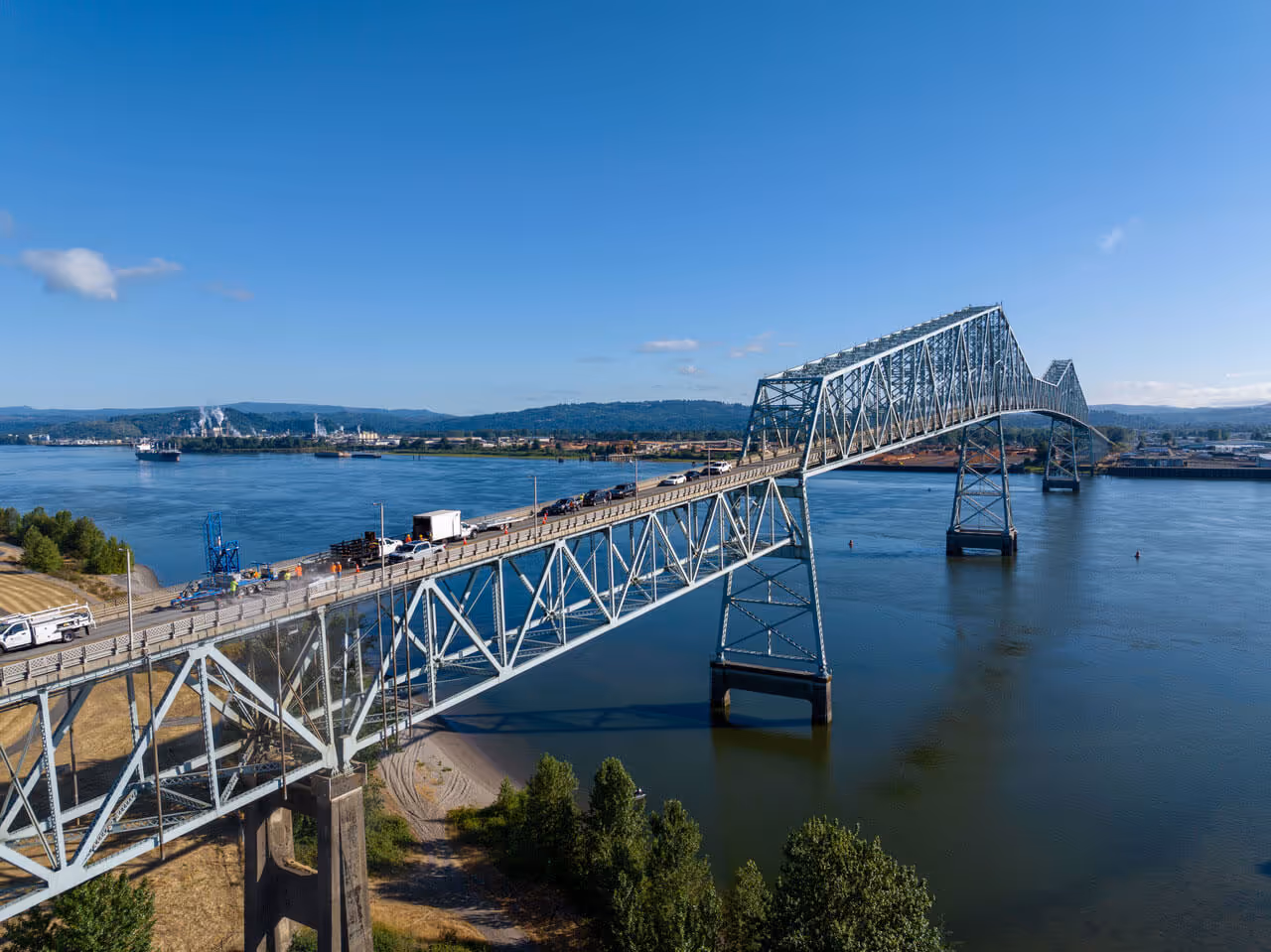 An aerial photo of the Lewis and Clark Bridge over the Columbia River connecting Washington and Oregon