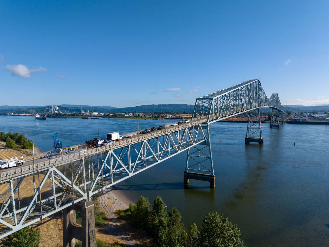 An aerial photo of the Lewis and Clark Bridge over the Columbia River connecting Washington and Oregon