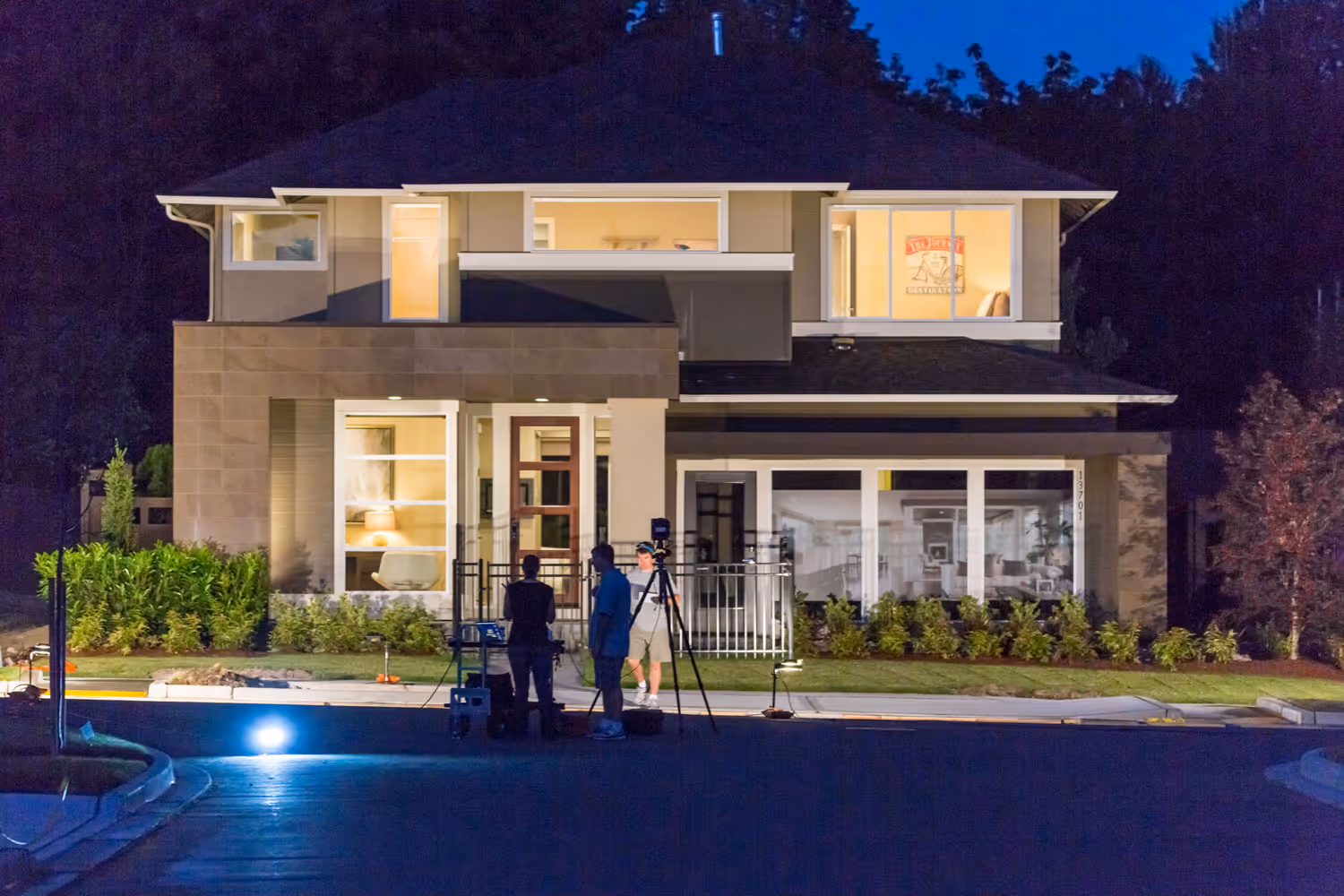 A team of a photographer and several assistants on a location photo shoot