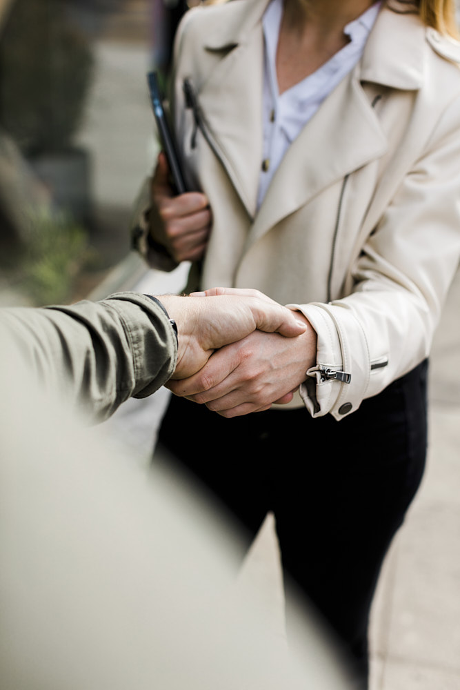 Photo of two people shaking hands