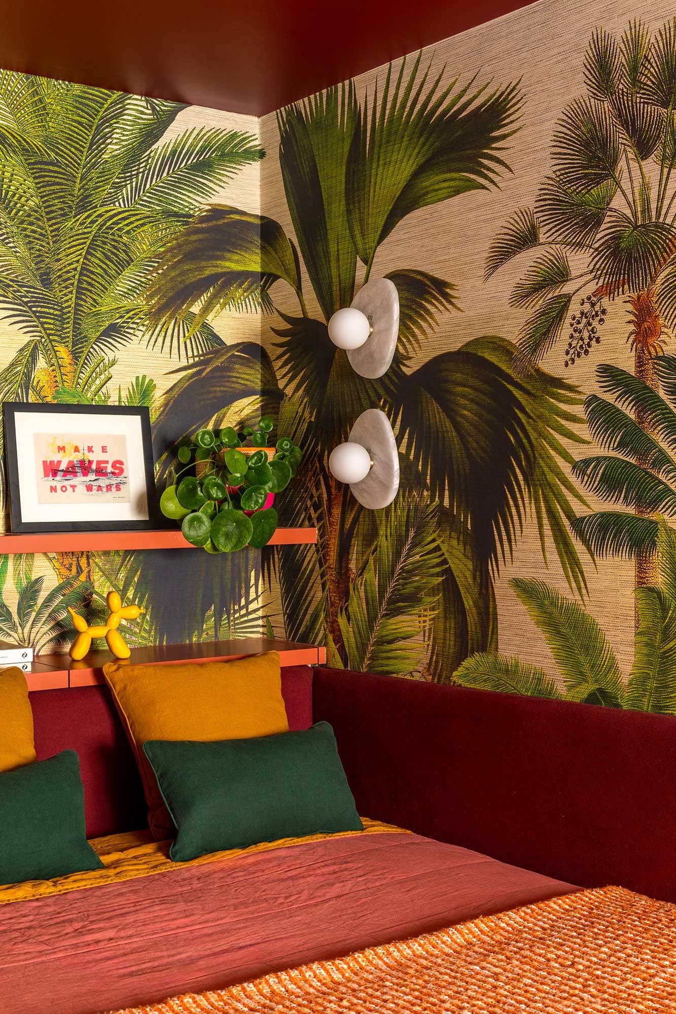 platform bed with drawers and a padded headboard that wraps the corner