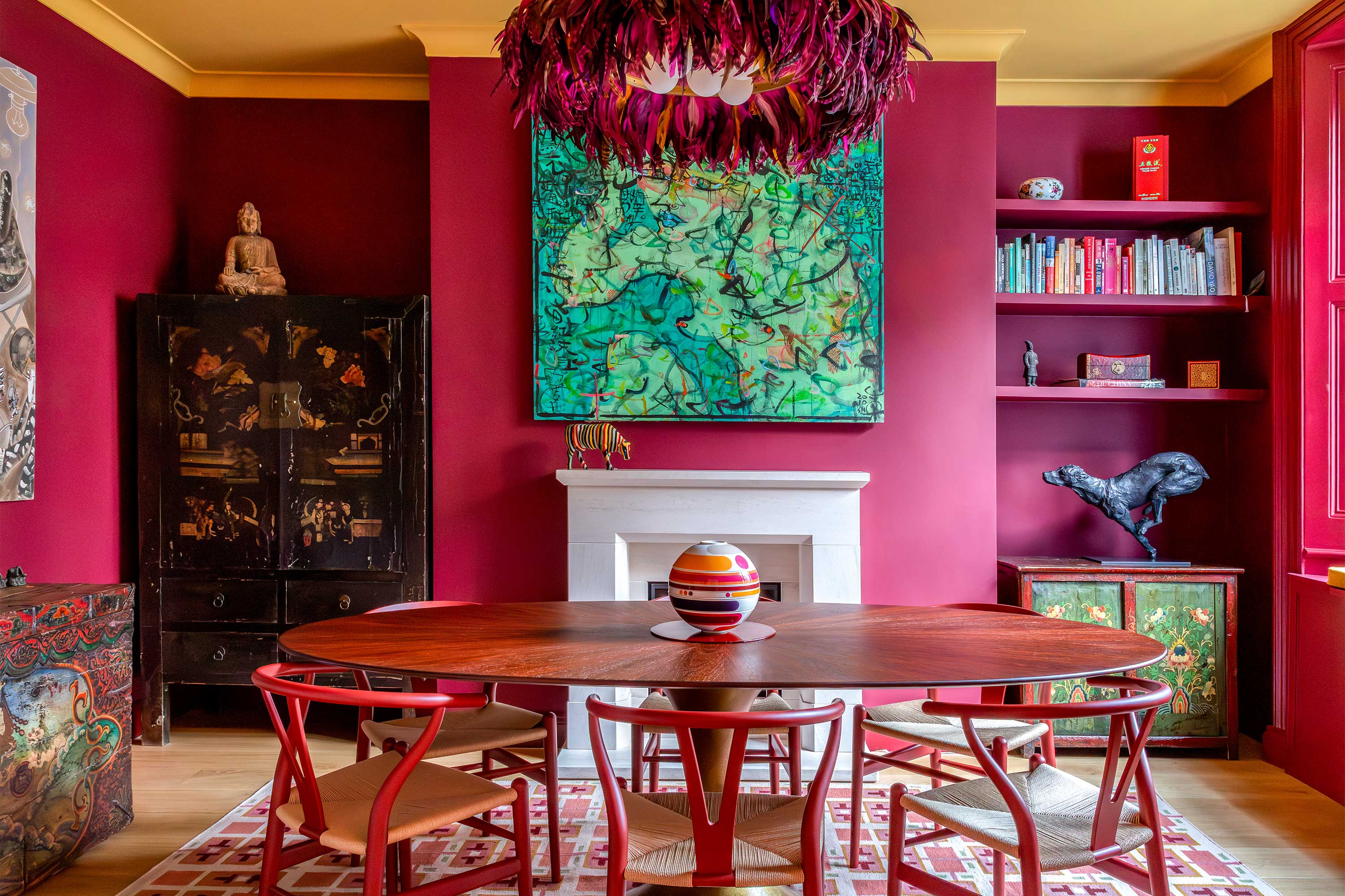 Formal dining room with feather lamp and feature dining table