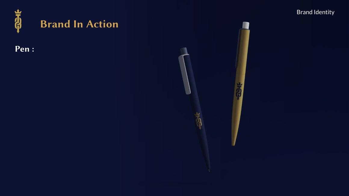 Two pens, one dark blue and one gold, each featuring a gold branded logo, displayed on a dark blue background with text 'Brand In Action' and 'Pen'.