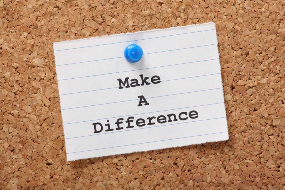 Image of a post-it note with the words "Make a difference" 
