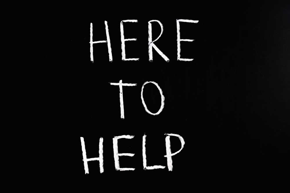 An image that reads "here to help" 