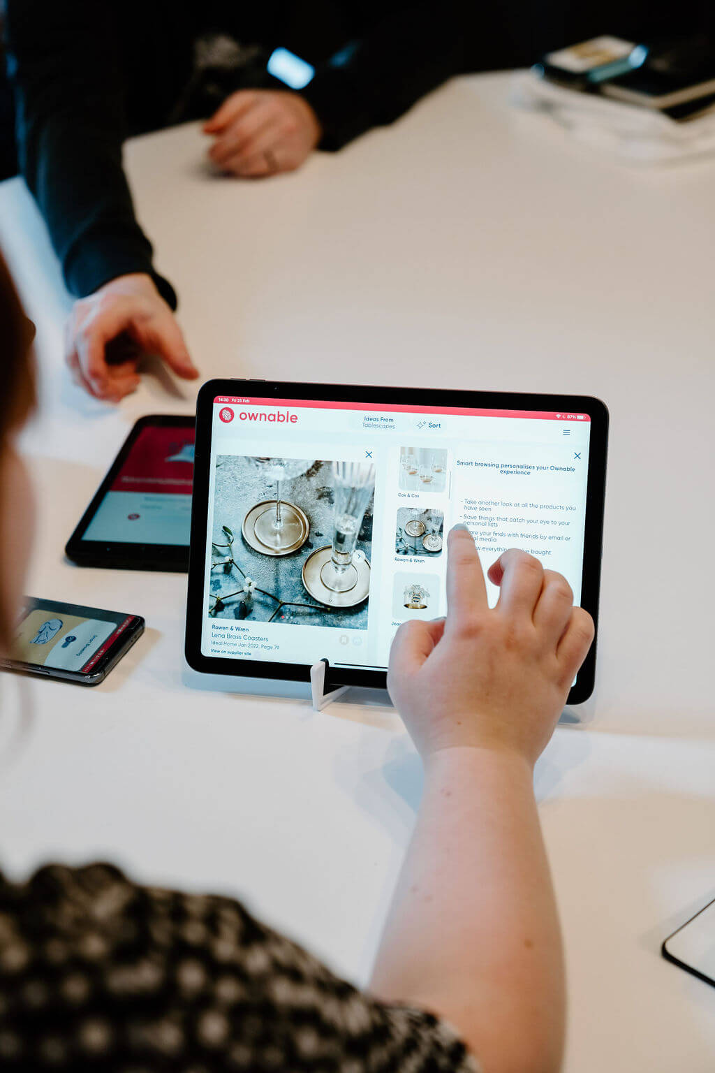 A person drawing on a white board