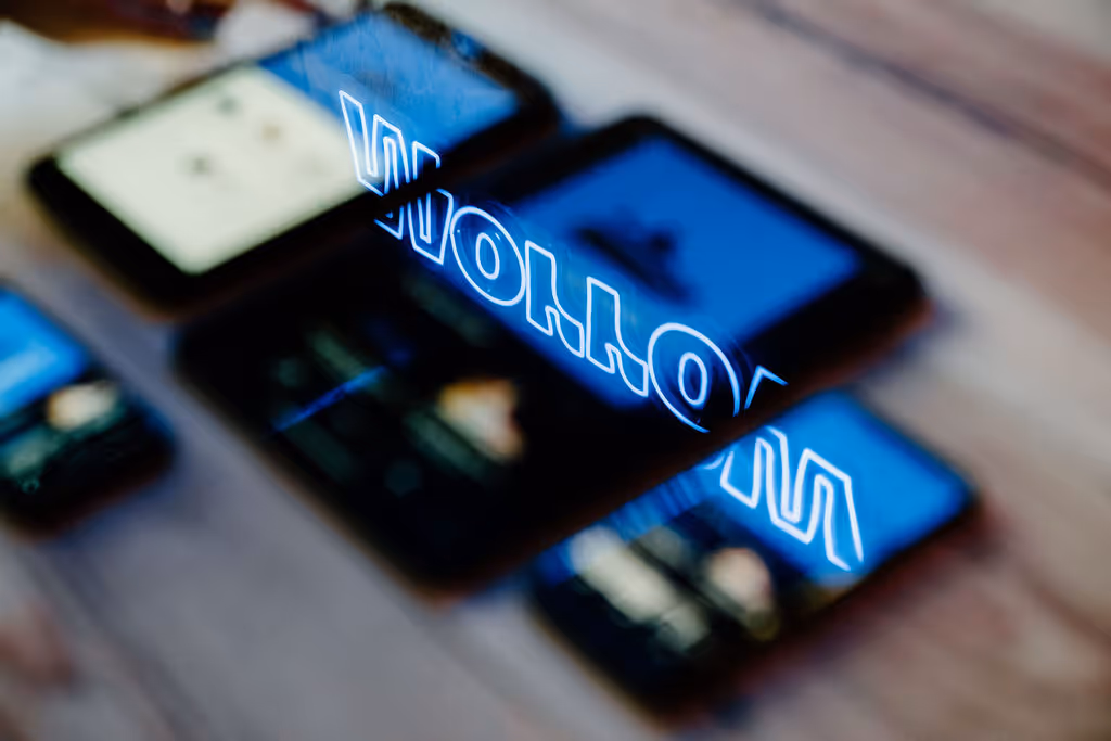 A photograph of people testing mobile apps on different devices