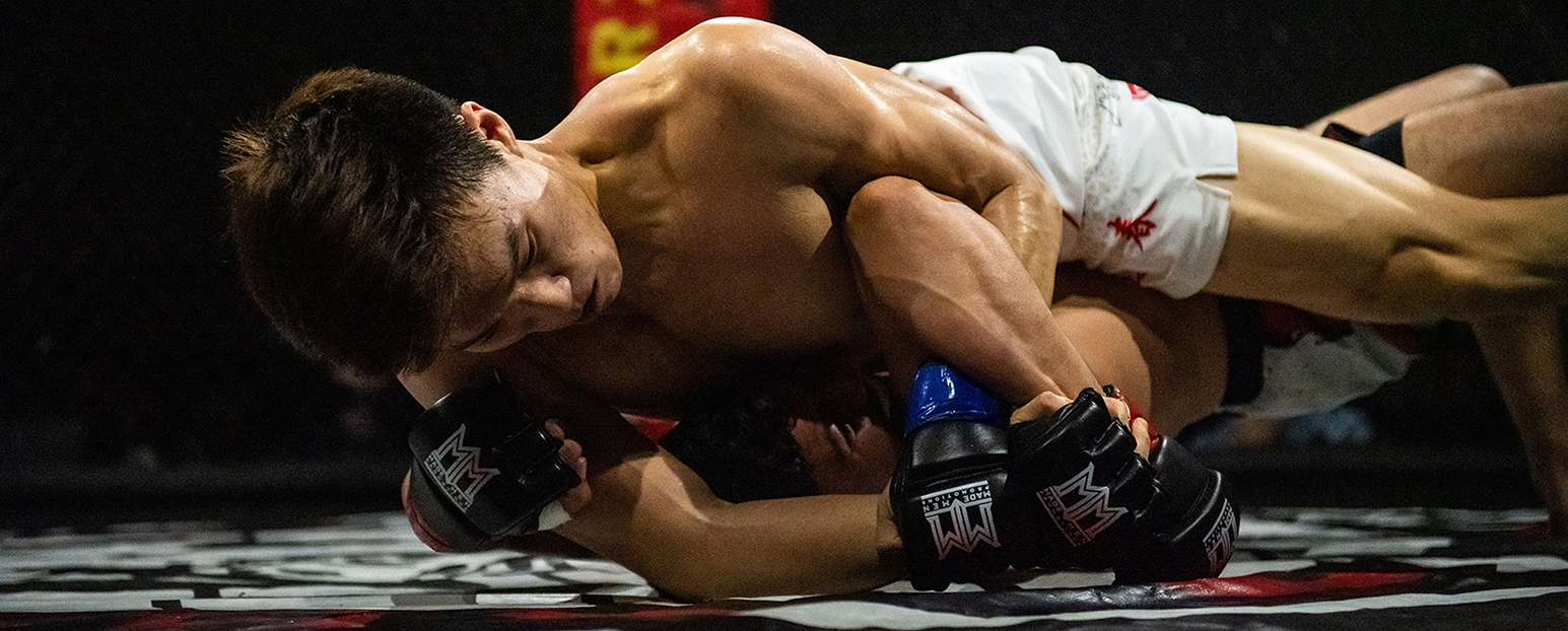 Teen student and instructor sparring
