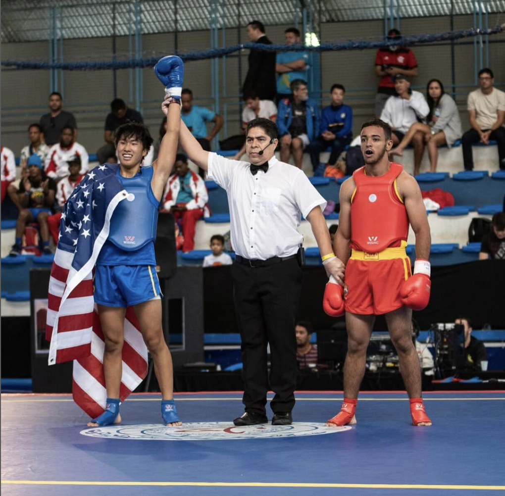 Vincent Meng with palms together