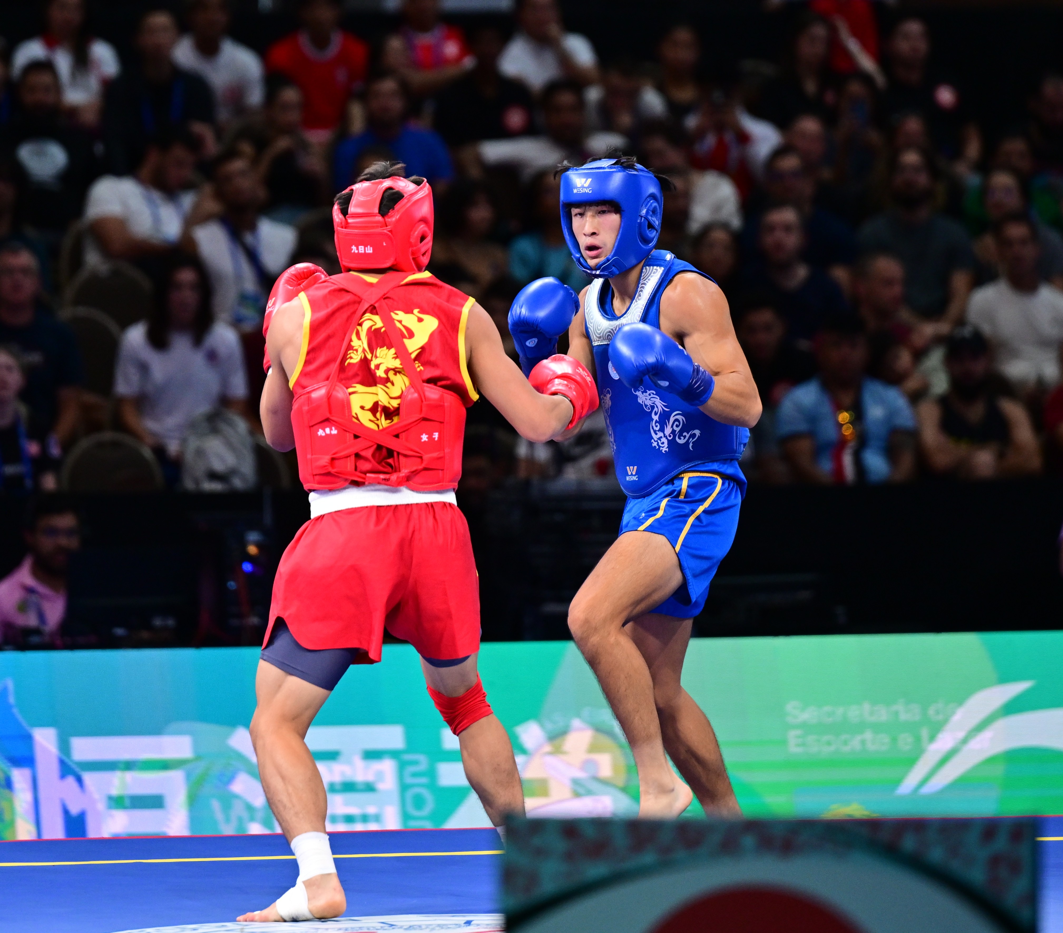 Instructor tying belt of a child student