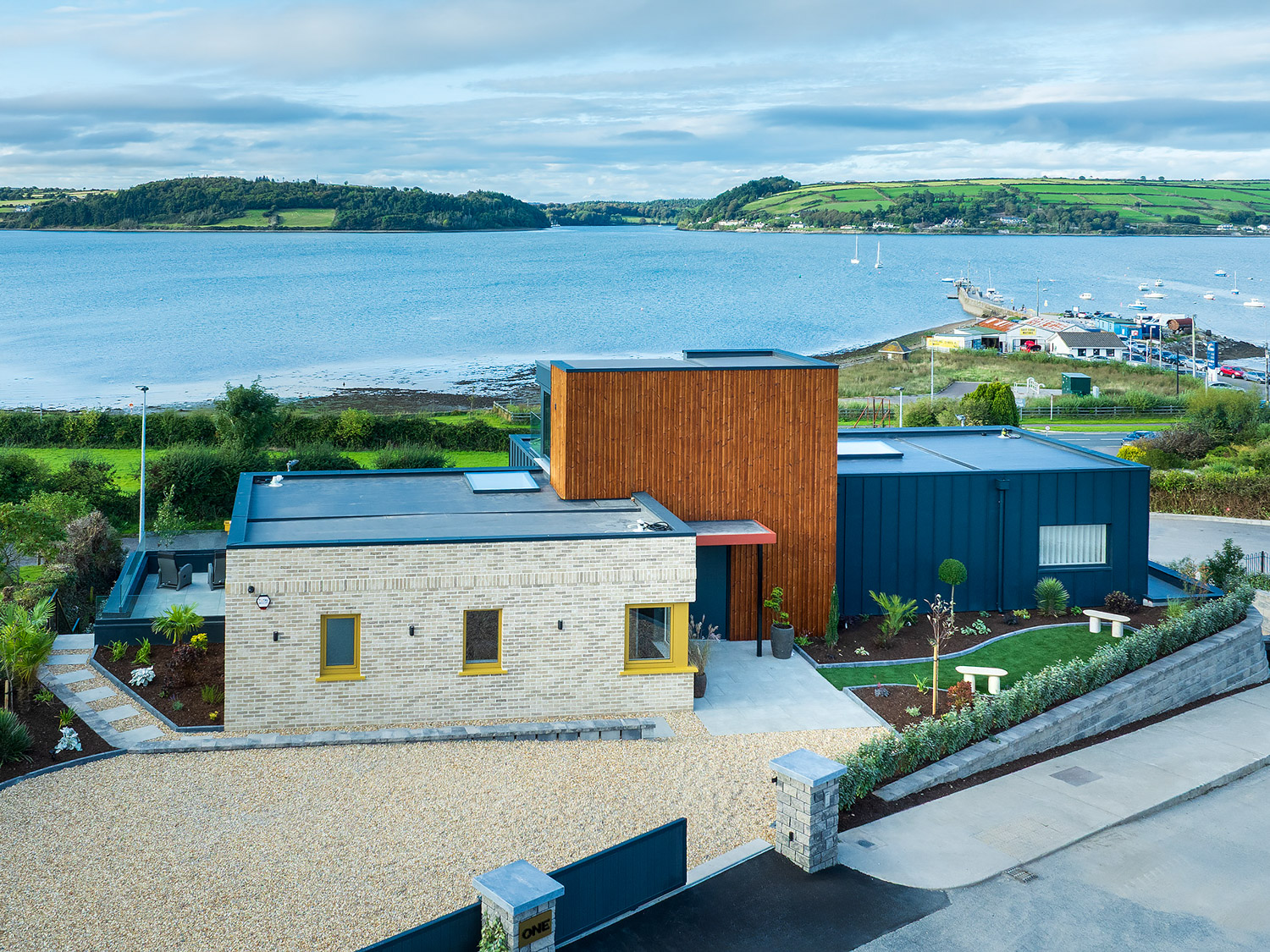 Modern private home overlooking Cork Harbour, featuring a three-stop Eco+ home lift providing access between levels.