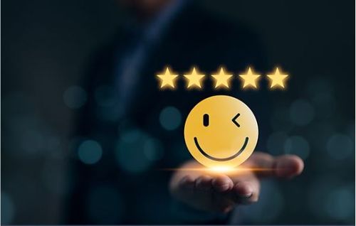 Five-star review and winking, smiley face