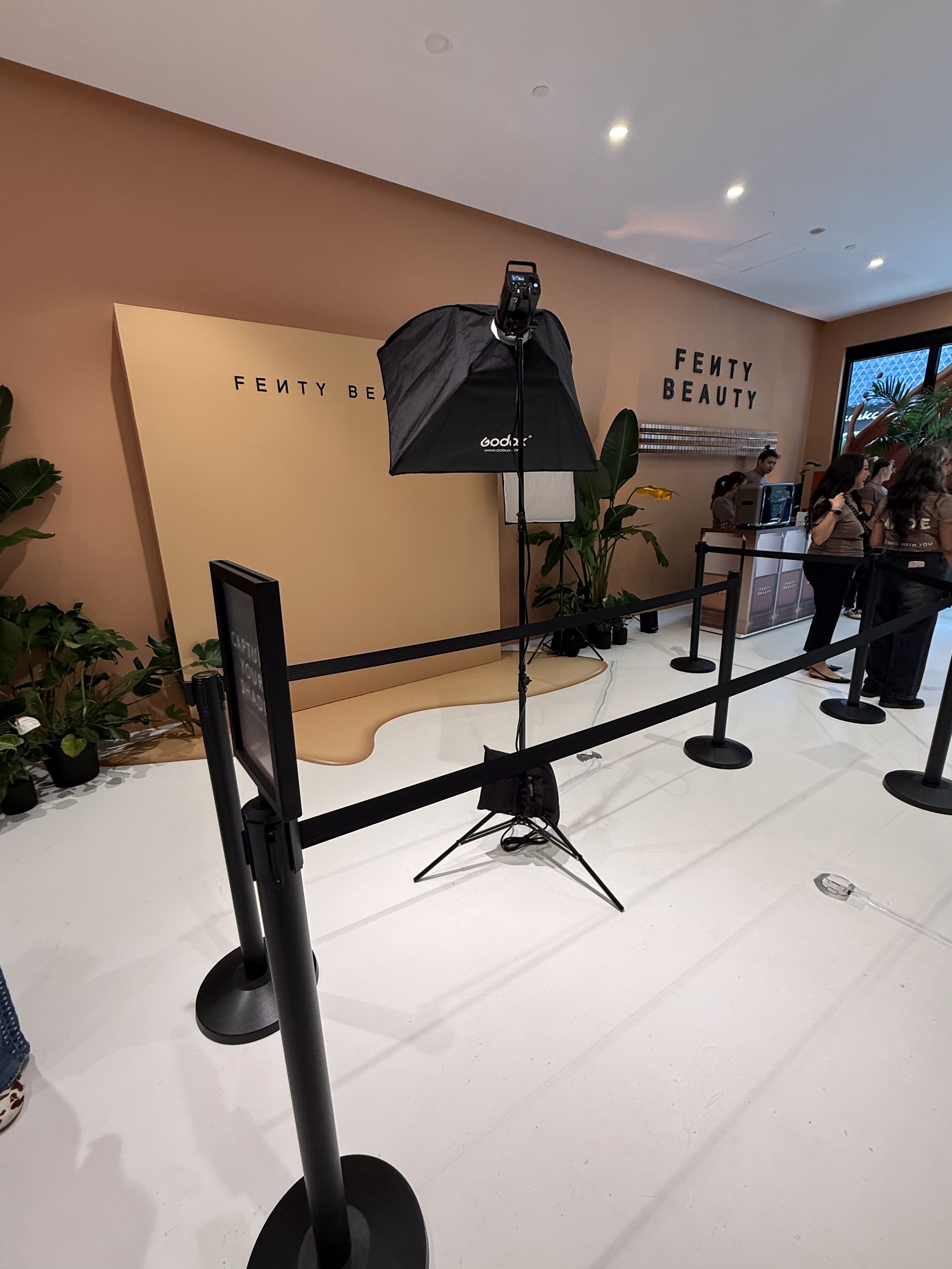 Branded editorial photo booth set with studio strobe for the Fenty Beauty pop-up in the Miami Design District