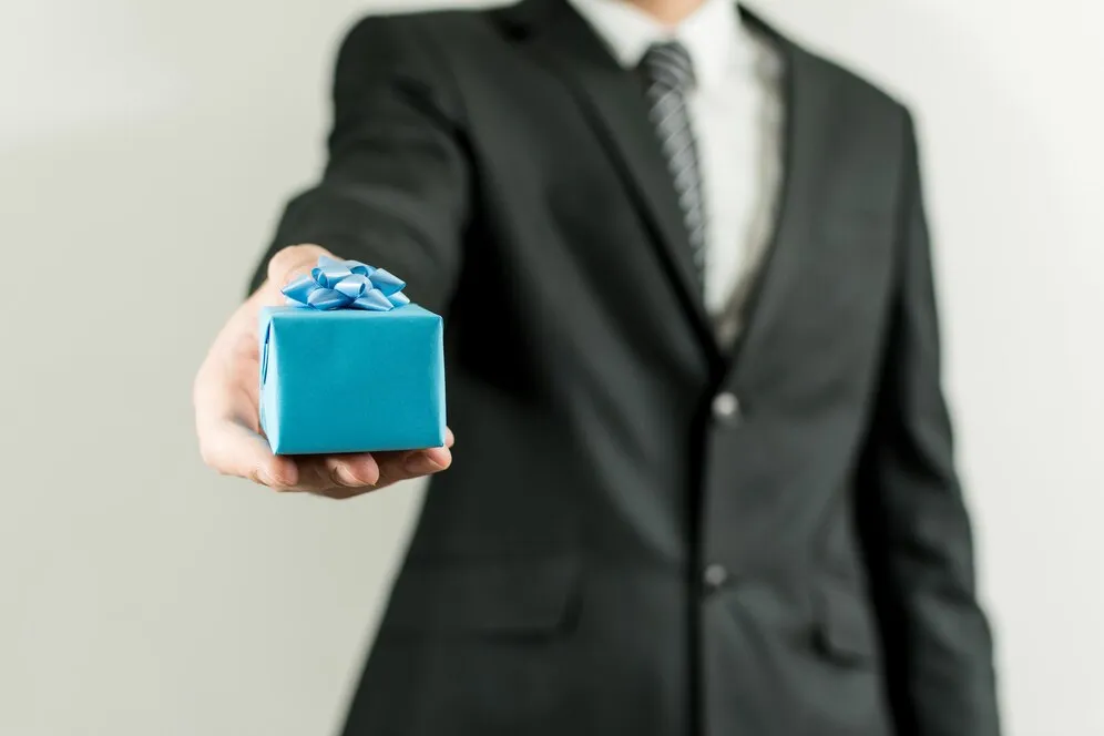 handing out corporate gifts