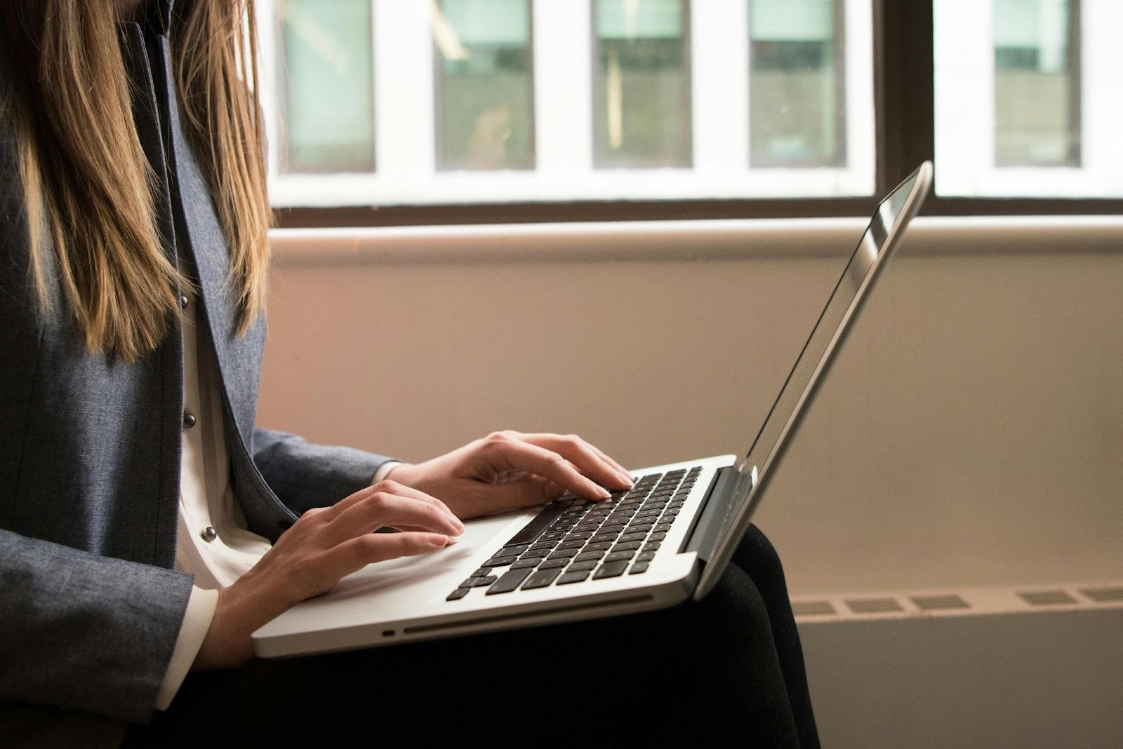 women using a MacBook Pro