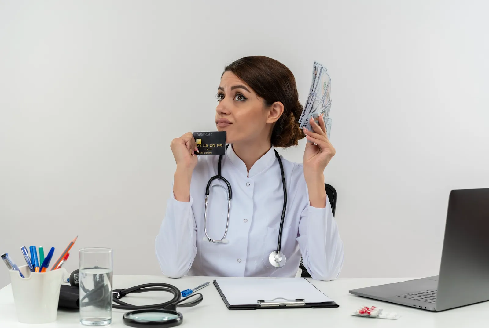 Healthcare professional with credit card