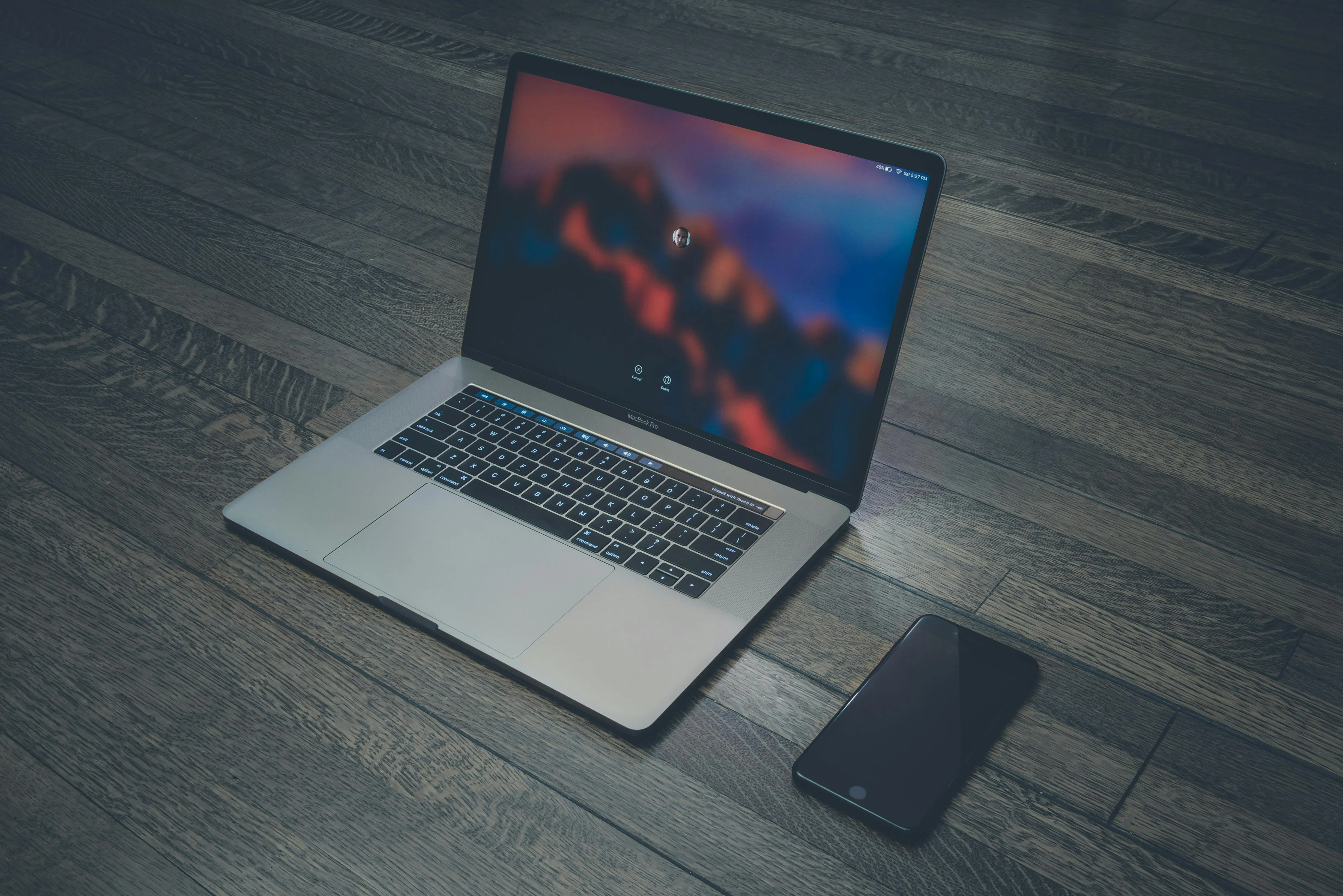 MacBook and iPhone on a desk
