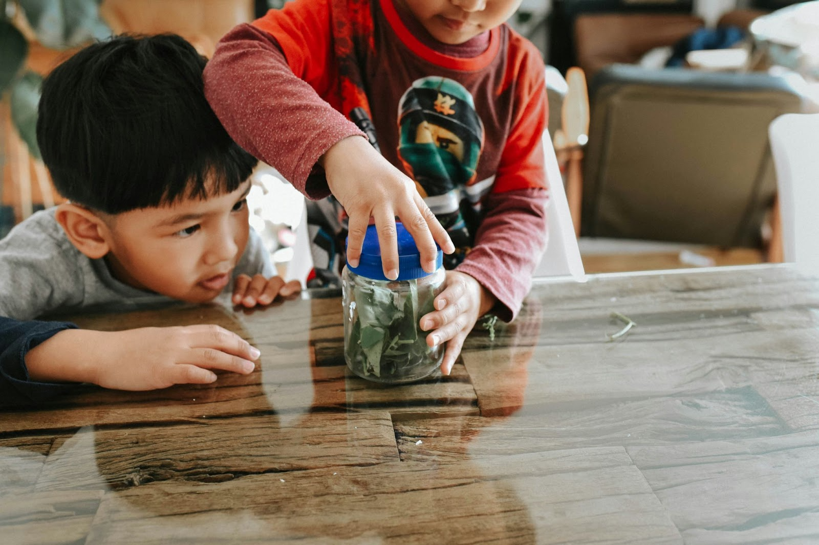Kids opening a jar