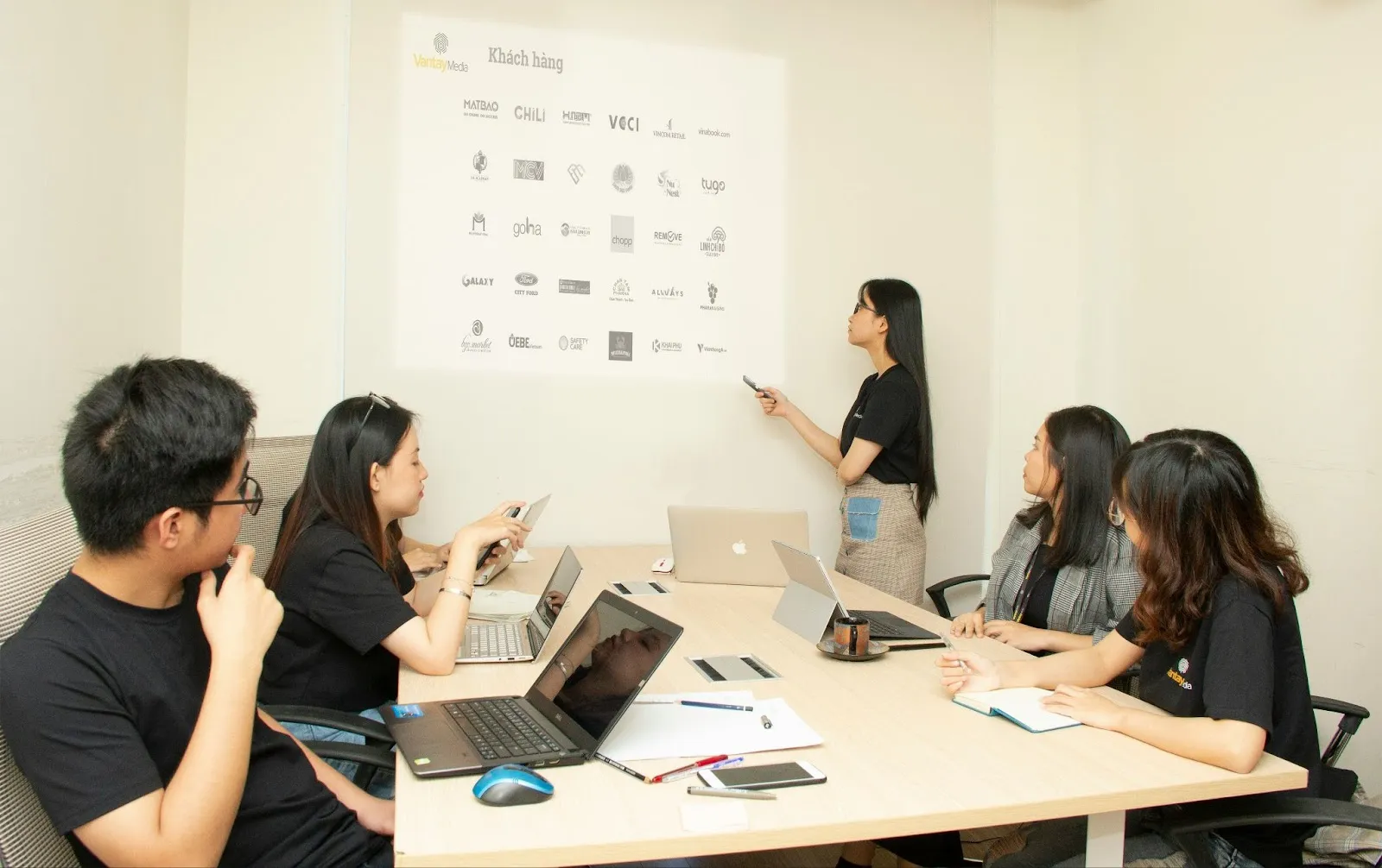 A team looking at a presentation