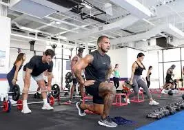 Group of people training in a gym