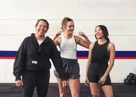 Females smiling in a gym