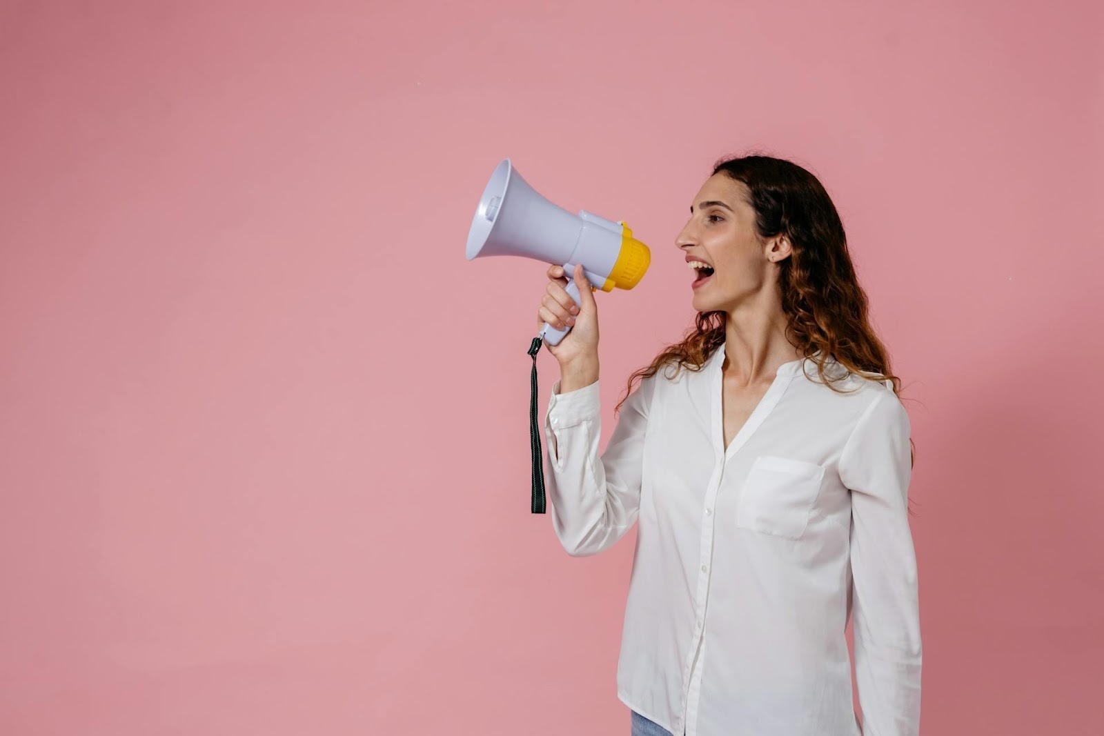 Women in white with a megaphone
