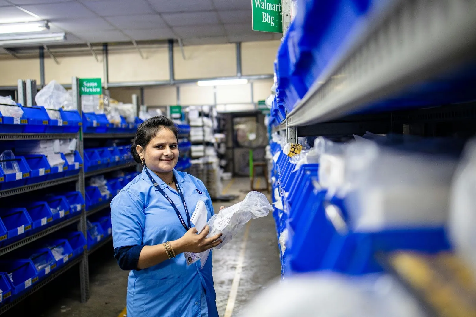 A women organising warehouse