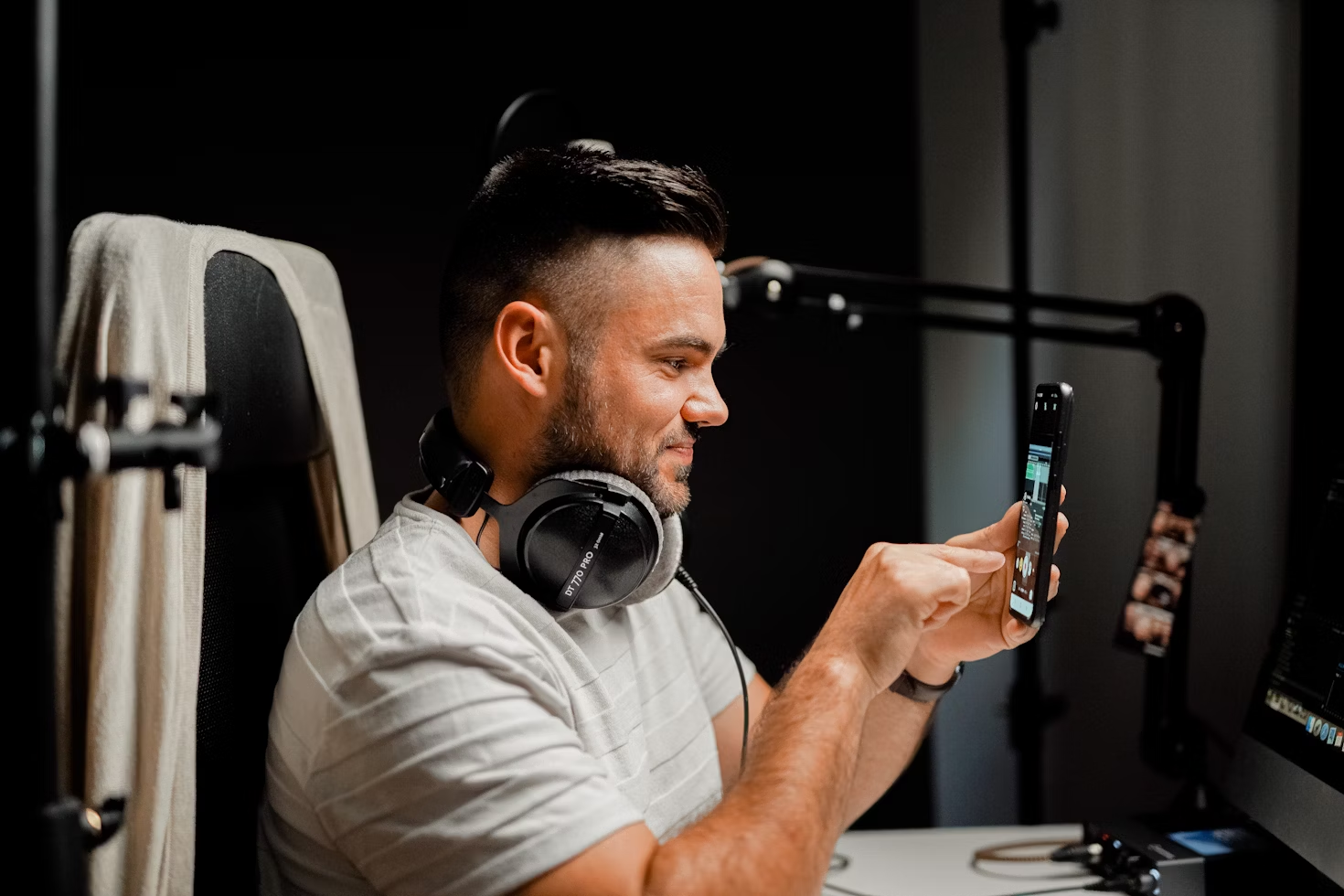 A content creator working in his studio.