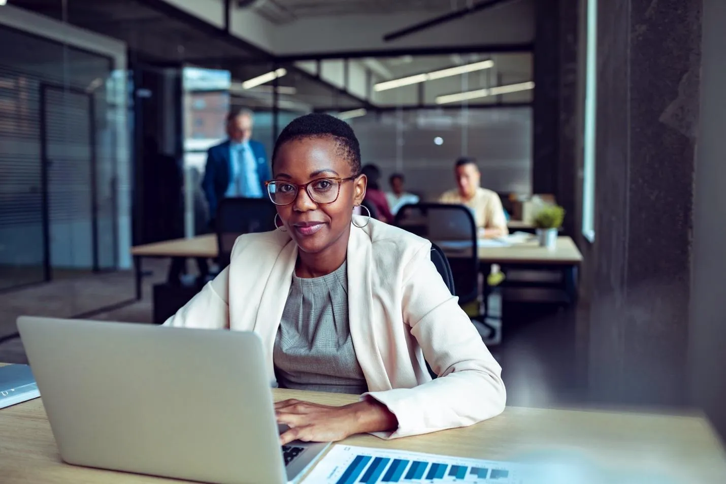 Woman in an office with laptop