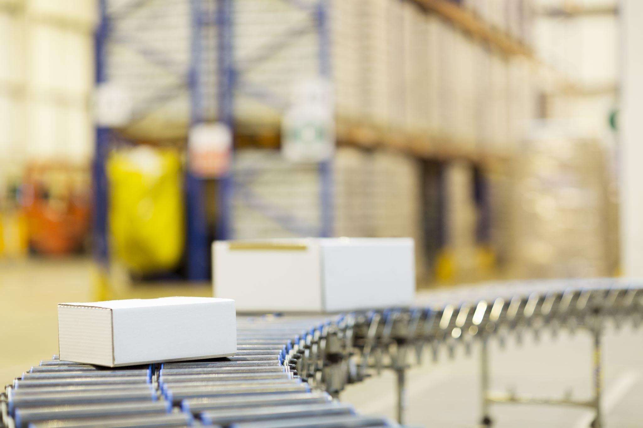 Packages on conveyor belt