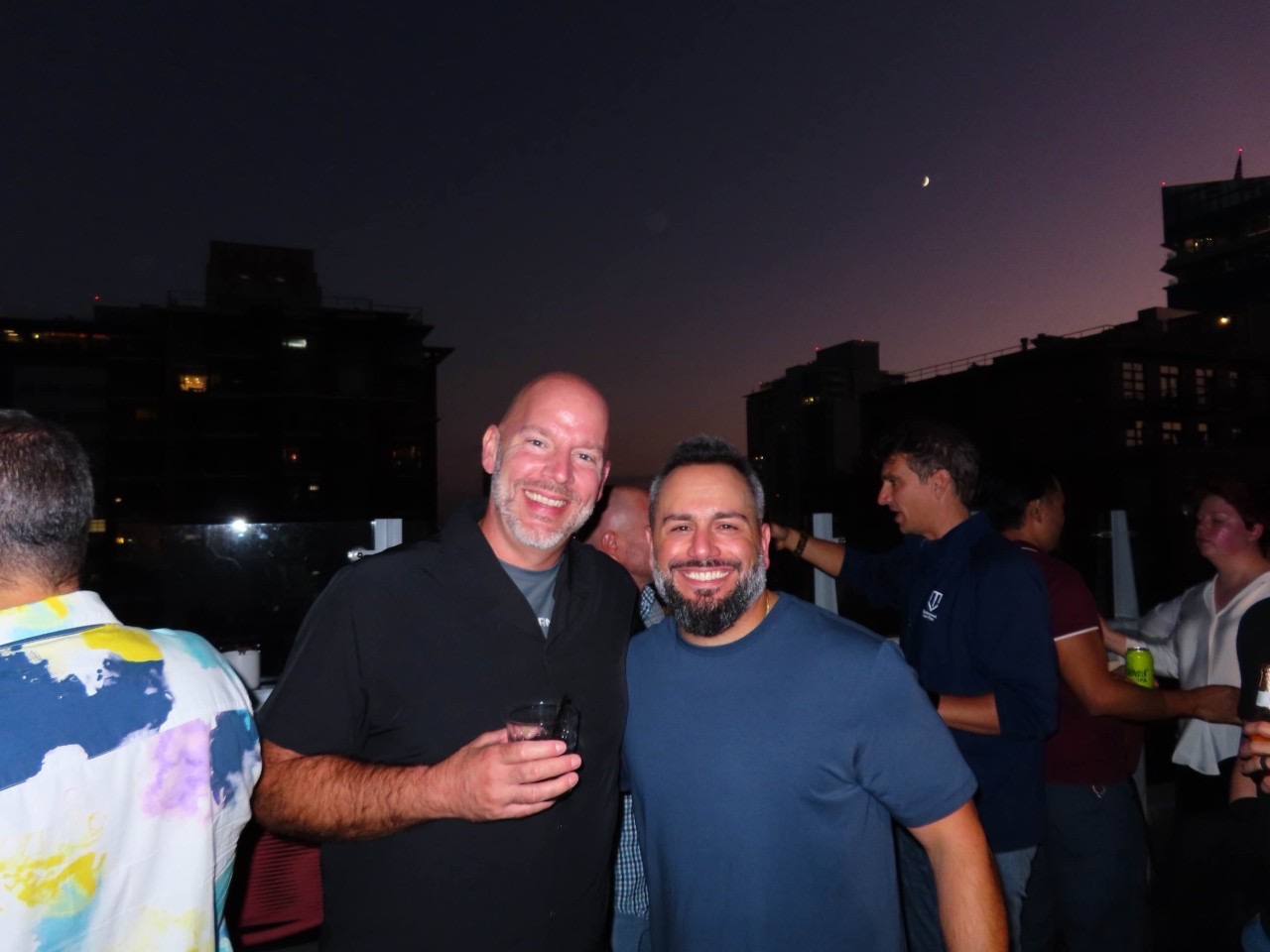 Shawn Huber and Amir at the Momentic, Previsible, and SE Ranking mixer at BrightonSEO in San Diego.