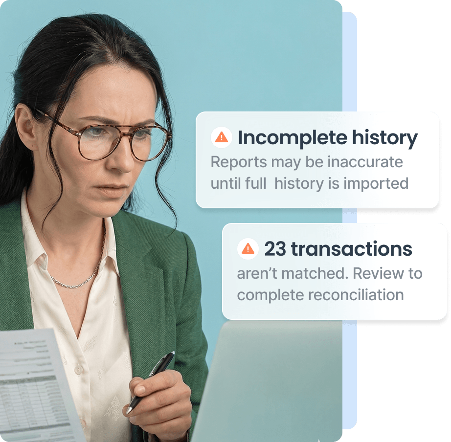 Woman with glasses and concerned expression holding a pen and paper, looking at a laptop with warning messages about incomplete history and unmatched transactions.