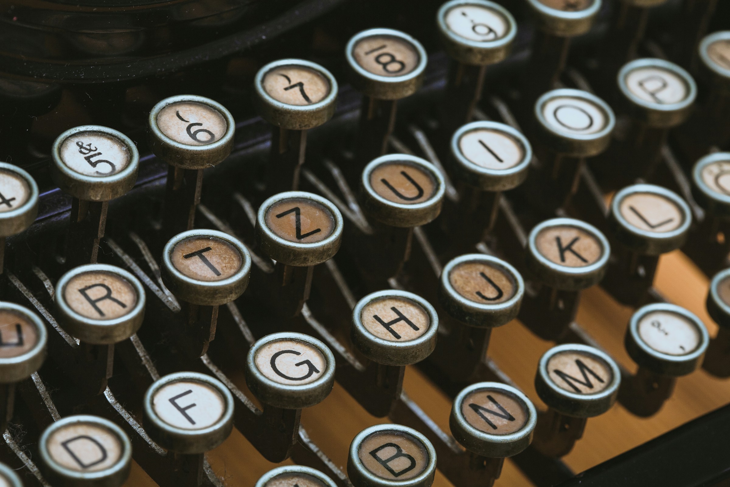 Round keys on an antique typewriter.