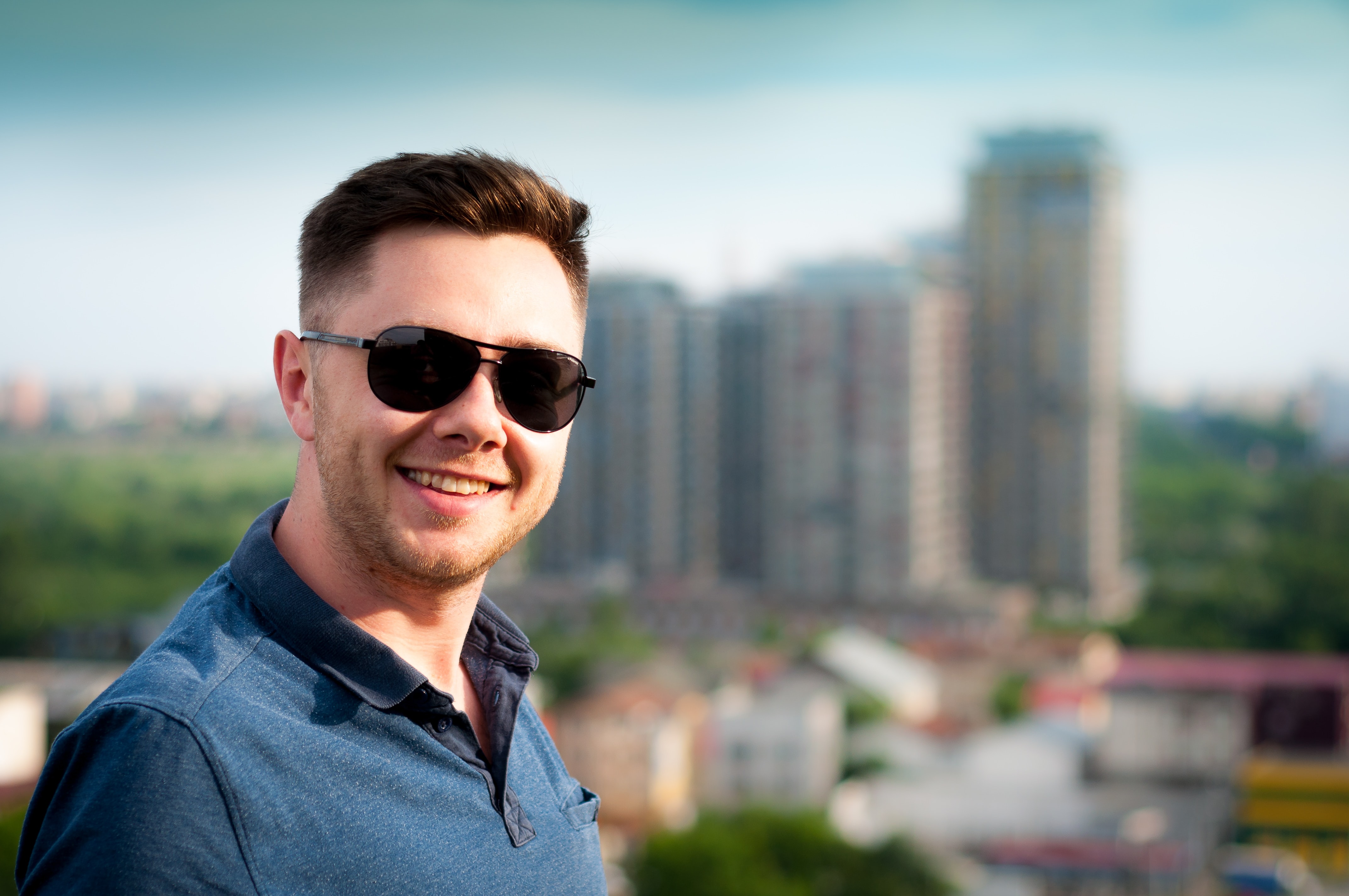 smiling man in sunglasses