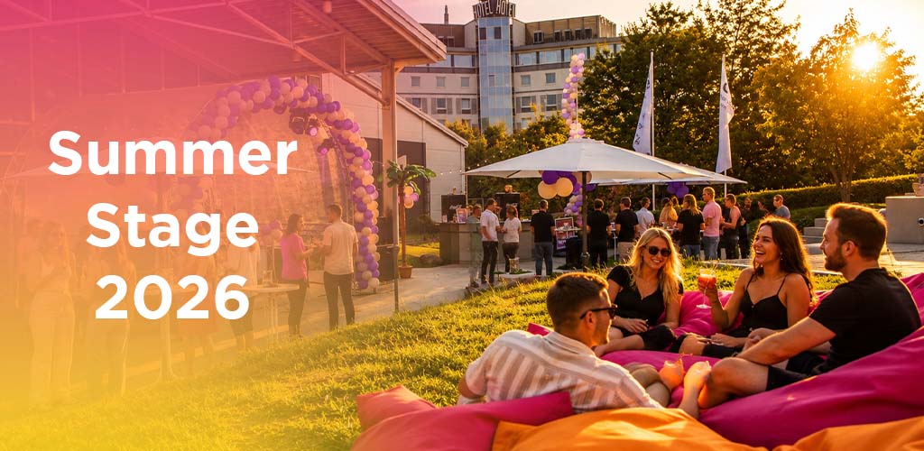 Menschen entspannen im Sommer 2026 auf einer Wiese mit Sitzsäcken und genießen sonniges Event im Freien.
