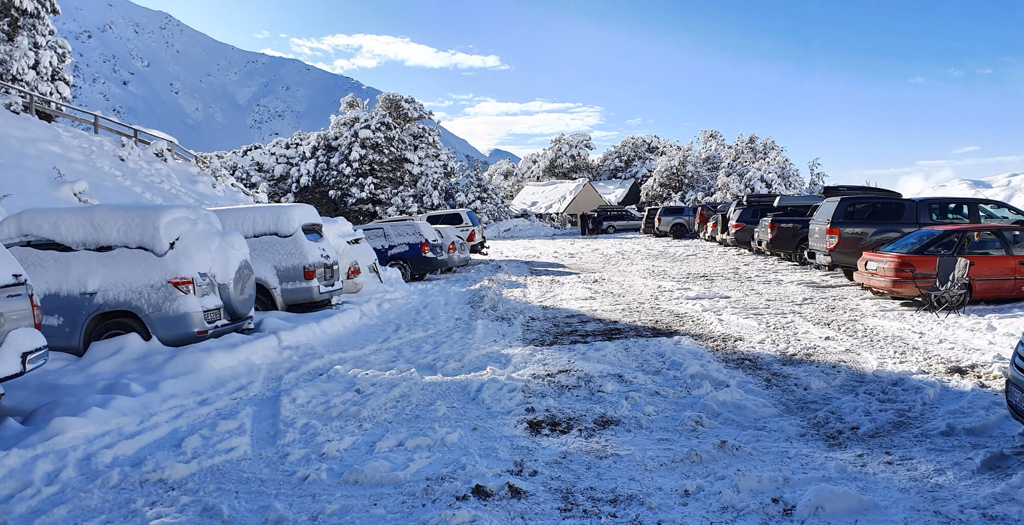Look at our cars all covered in snow in the Craigieburn Valley carpark