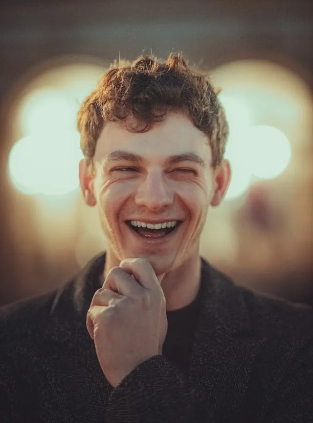 A happy entrepreneur looking and smiling at the camera