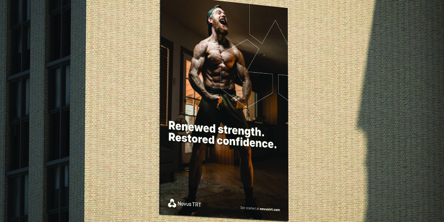 Wide muscular man with beard shouting and clenching fists in a dark room with text reading 'Renewed strength. Restored confidence.'