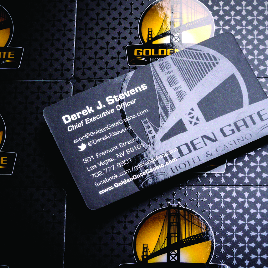 Business card for Derek J. Stevens, Chief Executive Officer at Golden Gate Hotel & Casino, with contact details and a stylized bridge logo.