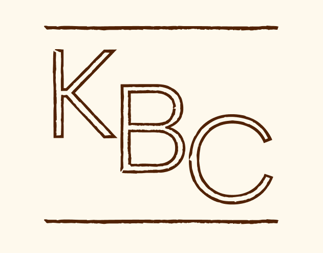 New logo - light cream background with the letters "KBC" stair-stepping down with a textured outline in a dark brown, so it looks kind of like a ranch brand mark. There are two lines above and below the letters in the same textured dark brown cream. 