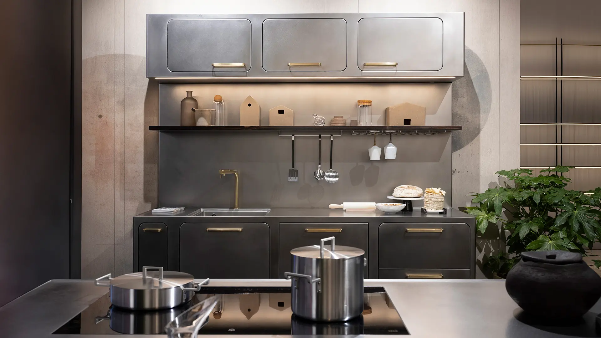 Steel kitchen with induction hob island