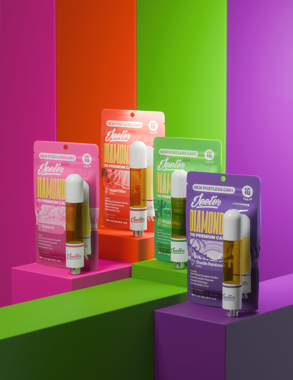 Four Jeeter Diamond 1g premium cannabis vape cartridges in colored packaging—pink (Bubba G), red (Apple Fritter), green (Prickly Pear), and purple (Double Rainbow)—each displayed with the cartridge standing upright on color-coordinated platforms against a colorful geometric background.