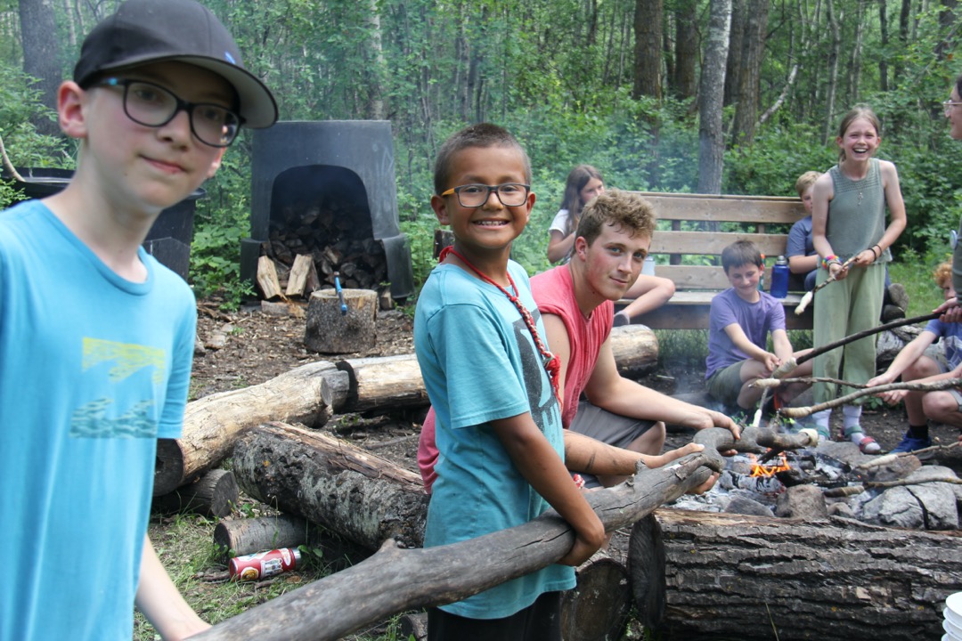 Two groups tubing wild waves at the lake.
