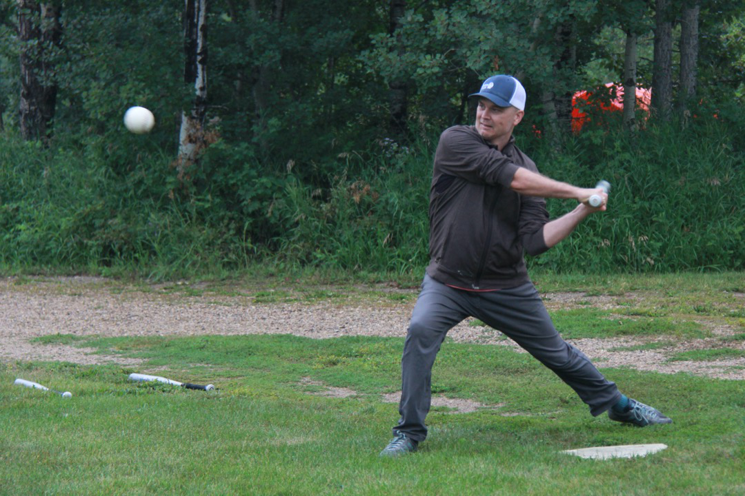 A crowd watches as fireworks are set off.