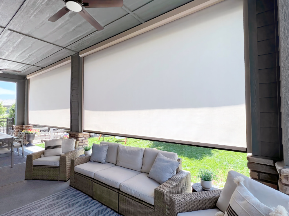 Retractable patio shades on a covered patio
