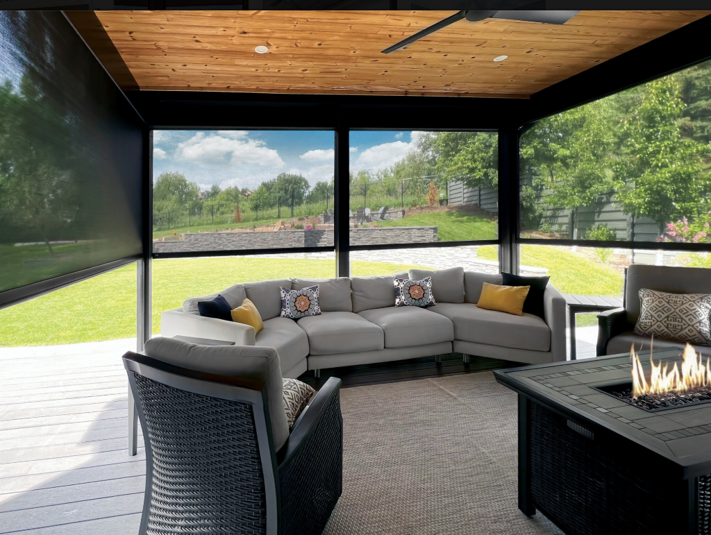 Motorized patio shades for an outdoor living space