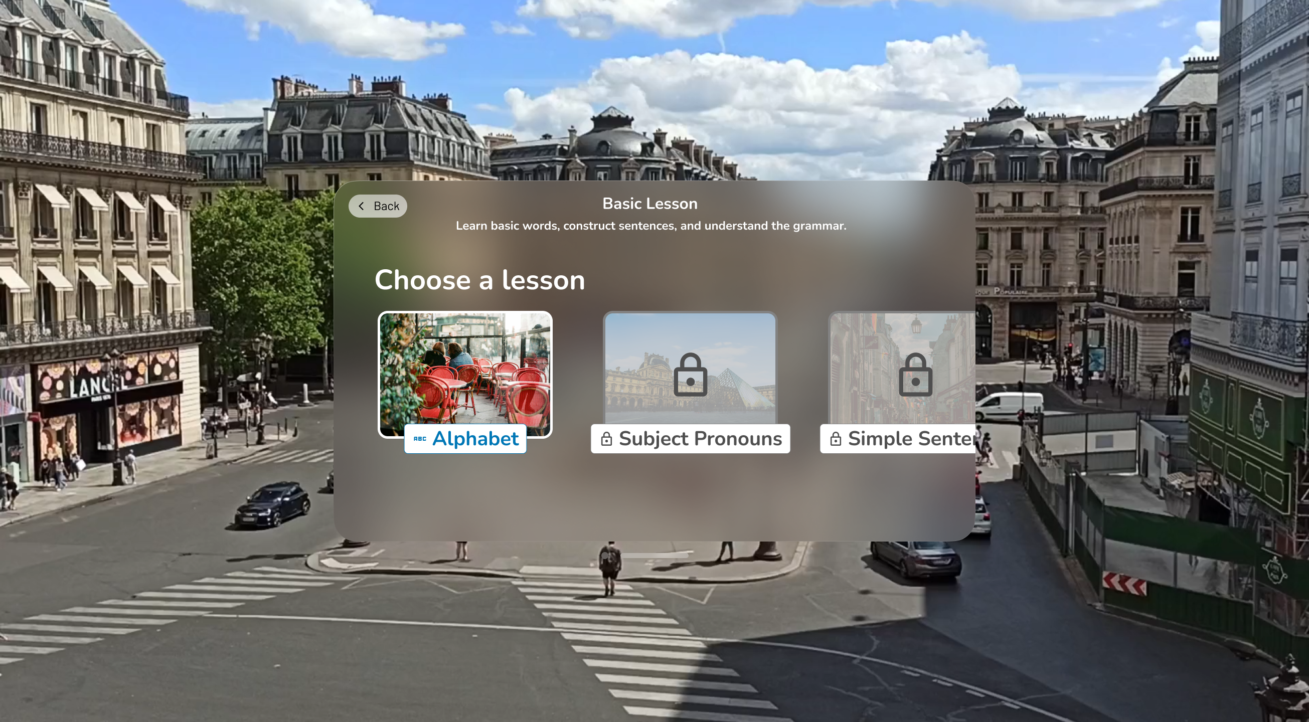 Language app screen showing Basic Lesson with options to choose Alphabet lesson or locked Subject Pronouns and Simple Sentences lessons.