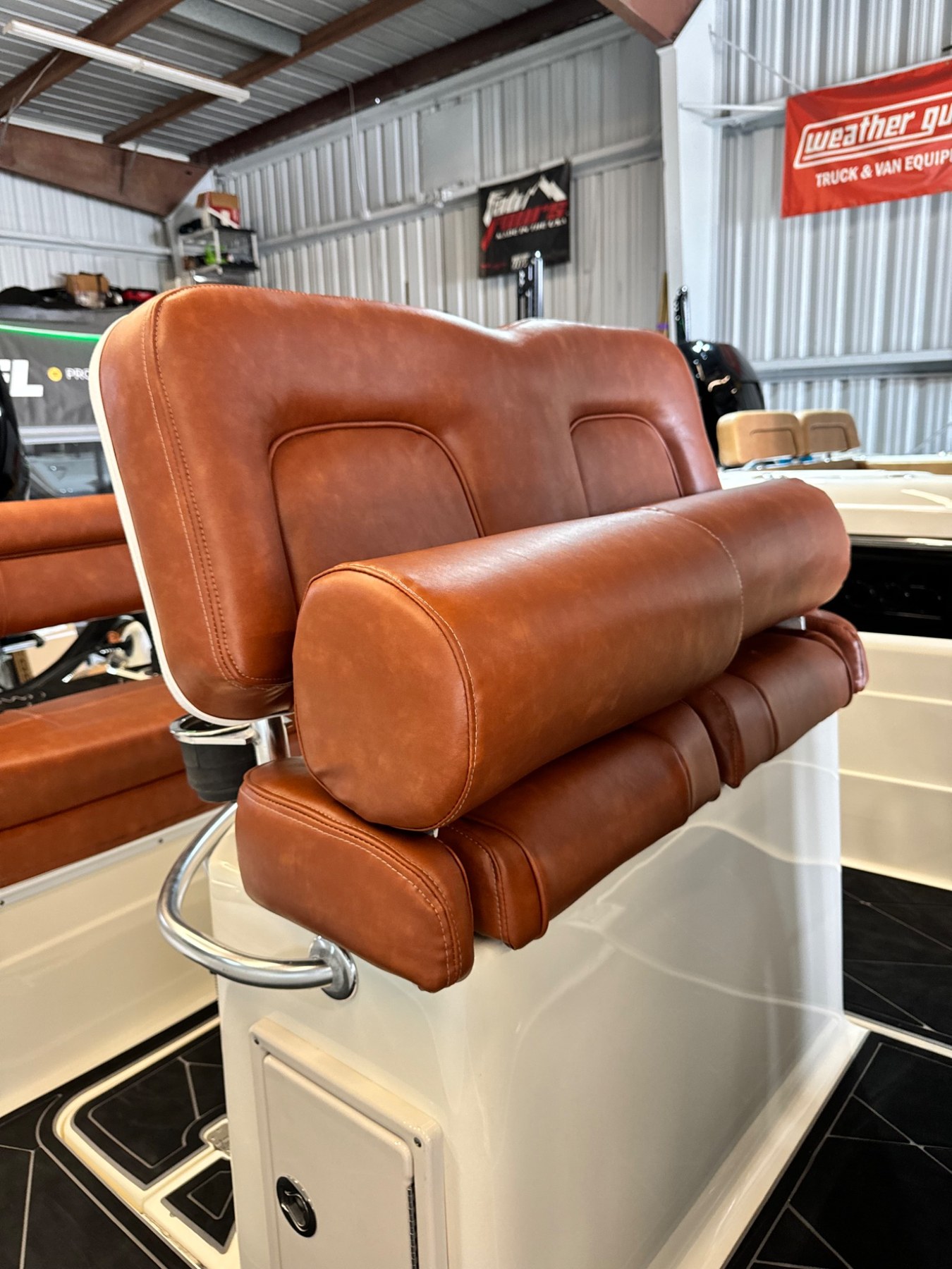 Brown upholstered leaning-post seating
